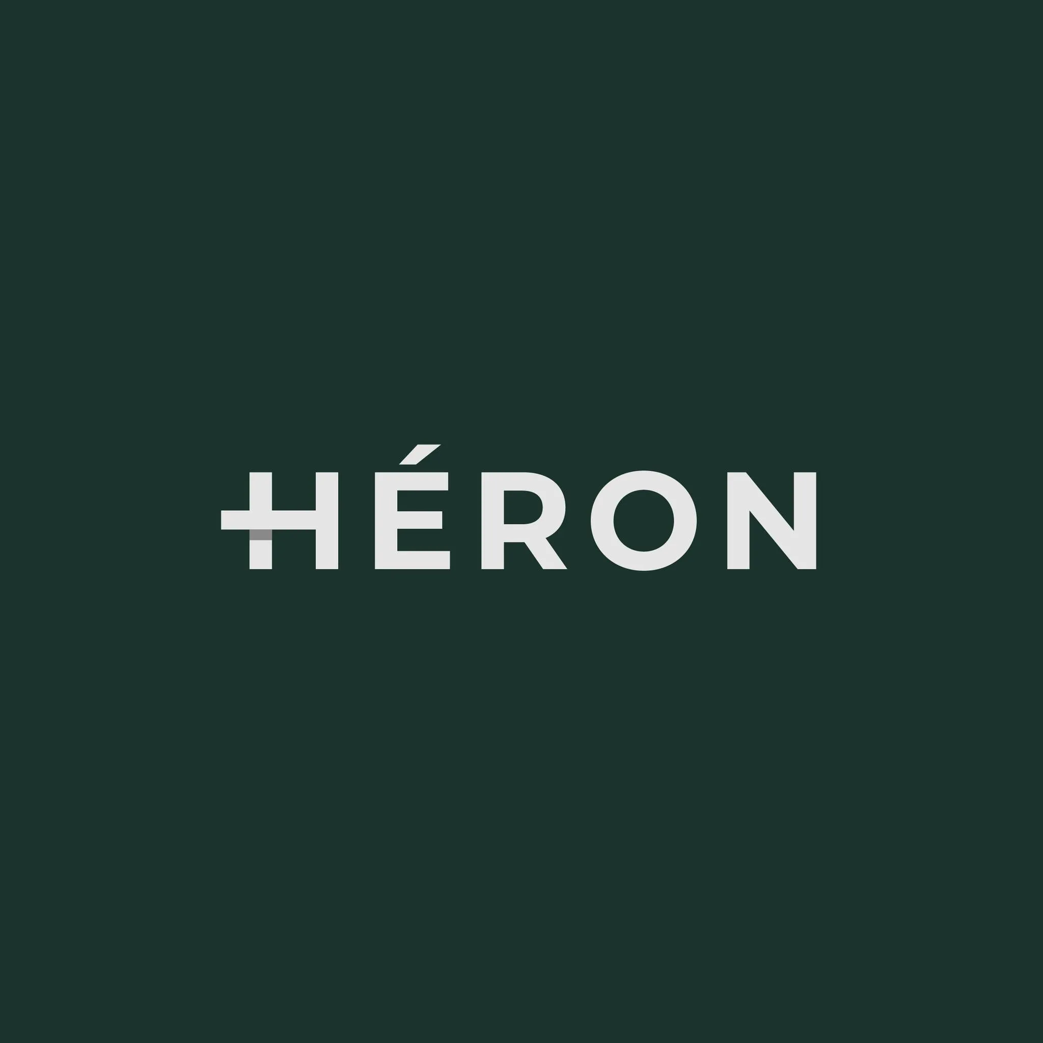 Héron watch brand logo