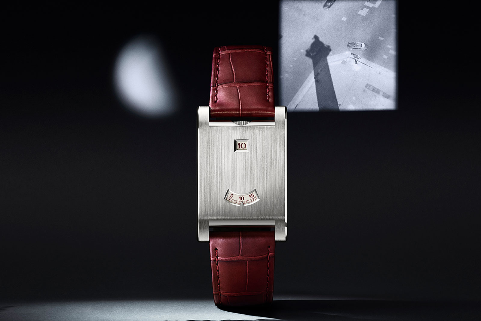 Cartier Privé Tank à Guichets ref. WGTA0236 in platinum with jump-hour and minute apertures on burgundy alligator strap